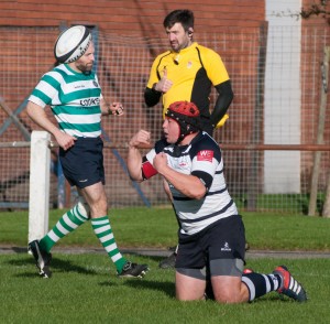 Pete celebrates scoring a try for Hoppers